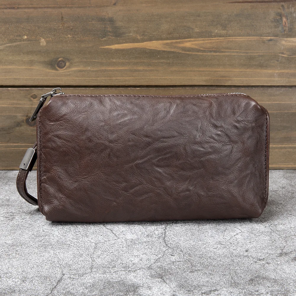 Bolso de mano de piel de vaca  - Travel Organizer Men reseña y precio